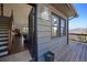 Entryway with hardwood floors, view of mountains, and open door at 538 Sawmill Creek Rd, Evergreen, CO 80439