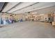 Large three-car garage featuring high ceilings and plenty of storage space at 538 Sawmill Creek Rd, Evergreen, CO 80439