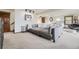 Cozy living space featuring a sectional sofa, plush carpeting, and natural lighting at 538 Sawmill Creek Rd, Evergreen, CO 80439