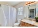 Standard bathroom with shower, toilet, sink, and overhead lighting at 9435 E 108Th Pl, Commerce City, CO 80640