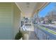 Inviting front porch featuring comfortable seating, perfect for relaxing and enjoying the neighborhood views at 9435 E 108Th Pl, Commerce City, CO 80640