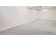 Finished basement with gray carpeting, a small window, and neutral walls ready for your personal touch at 16273 E Brown Pl, Aurora, CO 80013