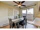 Charming dining area with a modern table set and a sliding glass door to the patio at 1865 Terry St # 3, Longmont, CO 80501