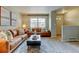 Well-lit living room with modern furnishings, large windows, and inviting decor at 1865 Terry St # 3, Longmont, CO 80501