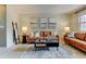 Comfortable living room featuring contemporary decor, ample seating, and a cozy rug at 1865 Terry St # 3, Longmont, CO 80501