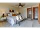 Charming main bedroom with carpet, and access to en-suite bathroom at 1865 Terry St # 3, Longmont, CO 80501
