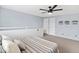 Comfortable bedroom featuring a ceiling fan and neutral decor, creating a serene and restful retreat at 8500 E Jefferson Ave # 16B, Denver, CO 80237