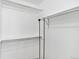 Walk-in closet with multiple rods for organizing clothes and accessories, maximizing storage space at 8500 E Jefferson Ave # 16B, Denver, CO 80237
