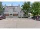 Apartment building featuring reserved parking spaces, number 16 is displayed on the building at 8500 E Jefferson Ave # 16B, Denver, CO 80237