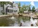 Beautiful pond with fountain and ducks, located near building number 13 at 8500 E Jefferson Ave # 16B, Denver, CO 80237