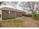Private backyard with patio, grill, mature trees, and lawn at 2860 Calkins Pl, Broomfield, CO 80020