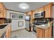 Well-equipped kitchen with stainless steel appliances and granite countertops at 26378 S End Rd, Kittredge, CO 80457