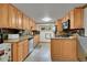 Traditional kitchen with stainless steel appliances and tiled backsplash at 26378 S End Rd, Kittredge, CO 80457