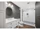 Modern bathroom with a glass-enclosed shower, stylish vanity, and contemporary fixtures at 4421 Tanager Trl, Broomfield, CO 80023