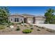 Attractive single-story home with a two-car garage and inviting front yard at 3705 Backslope Ln, Castle Rock, CO 80108