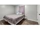 This bedroom features wood-look floors, a neutral color palette, and is the perfect size for a growing Gathering at 12131 Melody Dr # 101, Denver, CO 80234