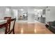 Spacious living space with open view to kitchen and dining area at 12131 Melody Dr # 101, Denver, CO 80234