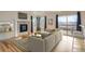 Cozy living room with fireplace, large sliding glass doors to deck and mountain views at 16645 W 2Nd Ave, Golden, CO 80401