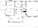 Open-concept floor plan with kitchen, living areas, and garage layout at 9239 Erminedale Dr, Lone Tree, CO 80124