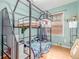 Stylish ' room featuring a modern bunk bed and plenty of space for play at 1341 Chester St, Aurora, CO 80010