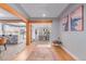 Bright living room with wooden beams and an open layout, perfect for modern living at 1341 Chester St, Aurora, CO 80010