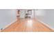 Spacious living room featuring hardwood floors, front door and an entry closet at 1341 Chester St, Aurora, CO 80010