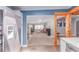 Bright, open-concept living room with an easy transition into a modern kitchen at 1341 Chester St, Aurora, CO 80010