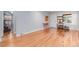 Bright and airy living room featuring light hardwood floors and neutral paint at 1341 Chester St, Aurora, CO 80010