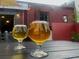 Close-up of two glasses of beer on a table, showing the neighborhood hangout at 3845 N Raleigh St, Denver, CO 80212
