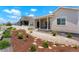 Charming backyard featuring a covered patio and views of a grassy field at 6070 Long Branch Dr, Parker, CO 80134