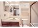 Bathroom with vanity, mirror, toilet, and tiled shower/tub combination at 3240 E 128Th Pl, Thornton, CO 80241