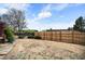 Fenced backyard with open area and landscaping at 7900 E Dartmouth Ave # 75, Denver, CO 80231
