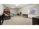 Spacious basement with neutral carpet and a window bringing in natural light at 7900 E Dartmouth Ave # 75, Denver, CO 80231