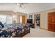 Spacious main bedroom with a vaulted ceiling, fan, and access to a walk-in closet at 7900 E Dartmouth Ave # 75, Denver, CO 80231