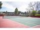 Outdoor tennis court on a partly cloudy day at 7900 E Dartmouth Ave # 75, Denver, CO 80231