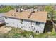 Rear view of the house with AC units on the roof at 4670 W Nevada Pl # A, Denver, CO 80219