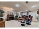 Finished basement featuring a fireplace, plush carpet, and comfortable seating arrangement at 20510 Oakbrook Ln, Parker, CO 80138
