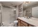 Clean bathroom featuring a walk-in shower, a single sink vanity, and neutral wall color at 20510 Oakbrook Ln, Parker, CO 80138