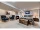 Spacious bedroom featuring a seating area and neutral walls at 20510 Oakbrook Ln, Parker, CO 80138