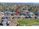 Attractive neighborhood with well-kept houses and manicured lawns, conveniently located near green spaces at 32 Latigo Pl, Littleton, CO 80123