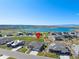 Charming community with beautiful lake views, well-kept landscaping, and attractive homes at 32 Latigo Pl, Littleton, CO 80123