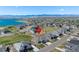 Panoramic aerial view of the property with mountain and lake views, situated in a well-planned community at 32 Latigo Pl, Littleton, CO 80123