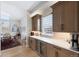Breakfast bar with built in beverage center perfect for entertaining at 32 Latigo Pl, Littleton, CO 80123