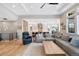 Open floor plan showcases the spacious living room connected to the modern kitchen at 32 Latigo Pl, Littleton, CO 80123