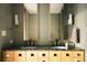 Elegant bathroom featuring granite countertops, double sinks, and modern lighting at 1133 14Th St # 2110, Denver, CO 80202