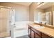 Bathroom featuring glass showers, tubs, sinks, and mirrors at 10176 Park Meadows Dr # 2403, Lone Tree, CO 80124