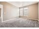 Bedroom with gray carpet, neutral walls, and windows with blinds at 10176 Park Meadows Dr # 2403, Lone Tree, CO 80124