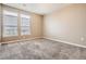 Bedroom featuring gray carpet, neutral walls, and two large windows with blinds at 10176 Park Meadows Dr # 2403, Lone Tree, CO 80124