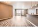 A spacious living room with an open floor plan with luxury vinyl flooring at 10176 Park Meadows Dr # 2403, Lone Tree, CO 80124