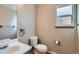 Updated half bath with new toilet and fixtures at 12144 Newport Dr, Brighton, CO 80602